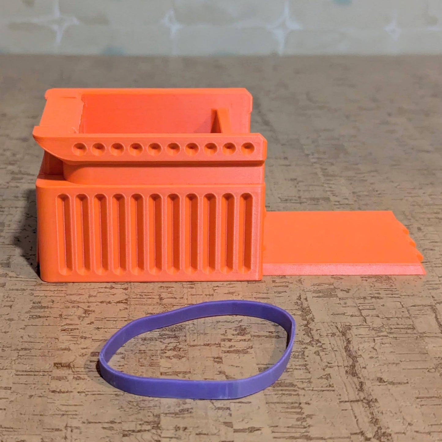 a 3d printed bandit box with an elastic band