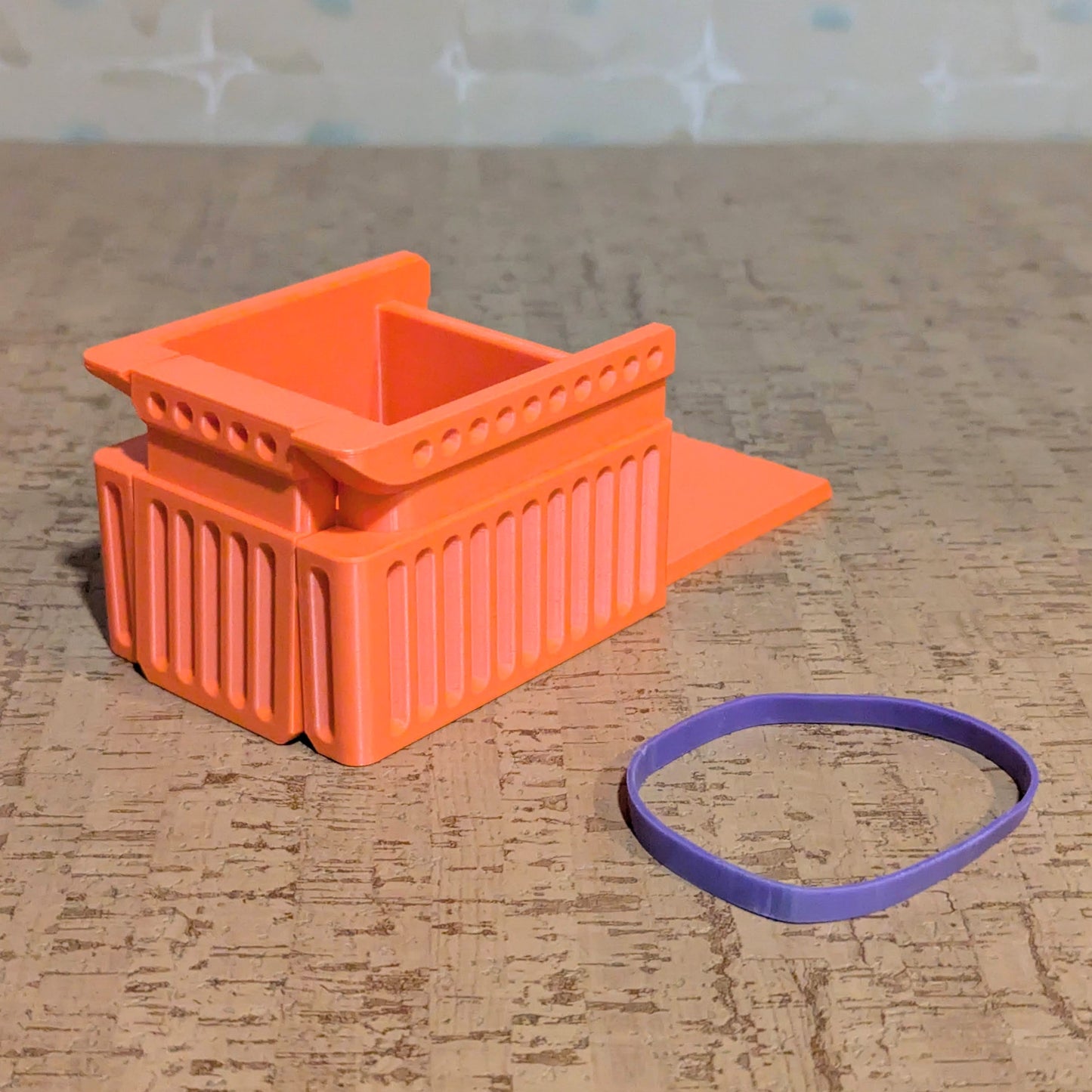 a bandit box with an elastic band on the side