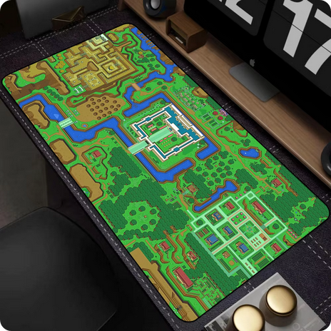 A Legend of Zelda theme mouse pad laid on a modern computer desk.