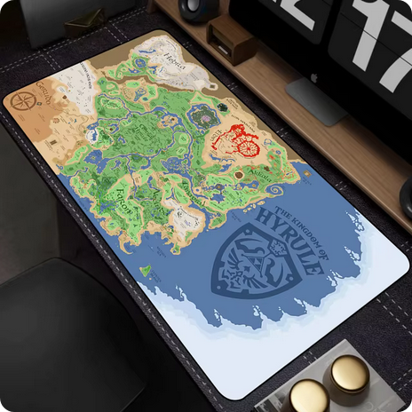 A Legend of Zelda theme mouse pad laid on a modern computer desk.