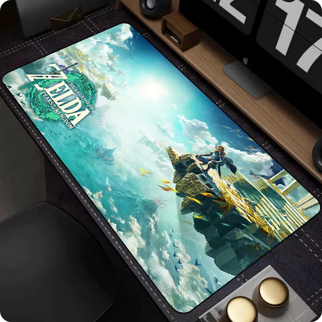 A Legend of Zelda theme mouse pad laid on a modern computer desk.