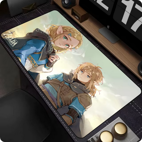 A Legend of Zelda theme mouse pad laid on a modern computer desk.