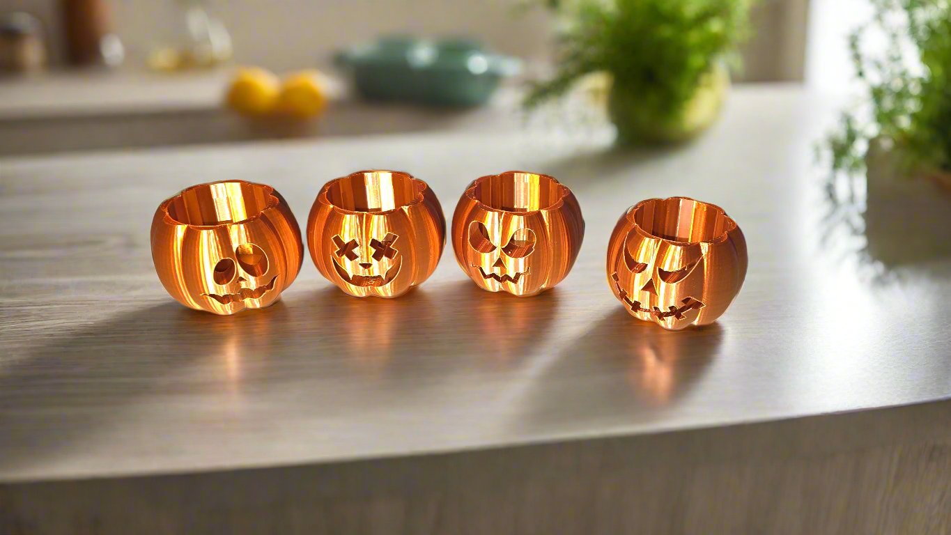 4 pumpkin shaped tealight holders