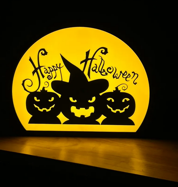 Happy Halloween lightbox featuring 3 pumpkins, one wearing a witch's hat