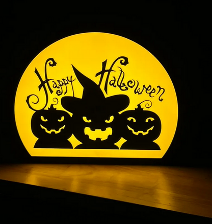 Happy Halloween lightbox featuring 3 pumpkins, one wearing a witch's hat