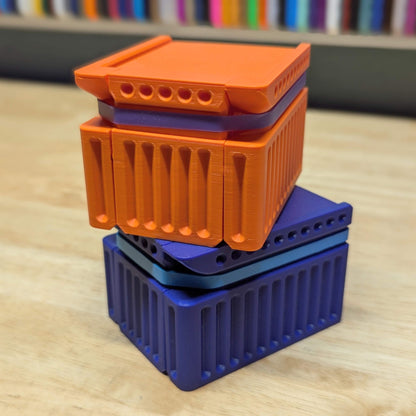 two bandit boxes stacked on top of each other