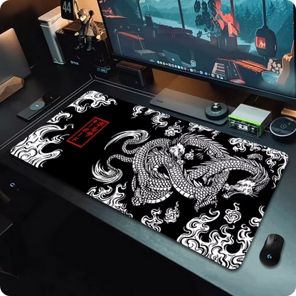 a japanese dragon mouse mat on a computer desk