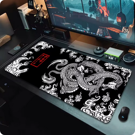a japanese dragon mouse mat on a computer desk