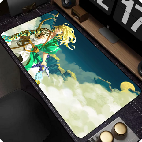 A Legend of Zelda theme mouse pad laid on a modern computer desk.